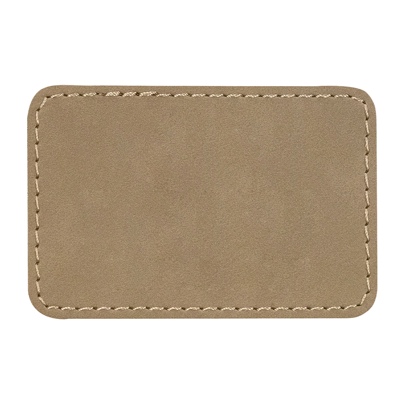Prostokątne naszywki ze sztucznej skóry o wymiarach 3 1/2' x 2 1/2'.