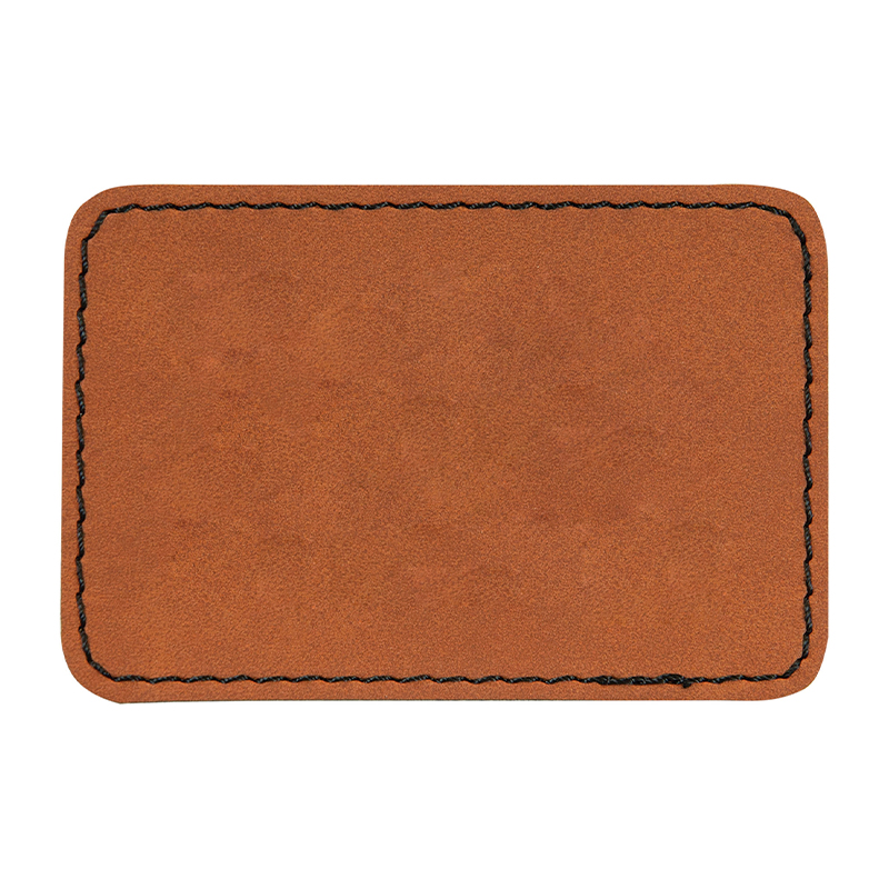 Prostokątne naszywki ze sztucznej skóry o wymiarach 3 1/2' x 2 1/2'.
